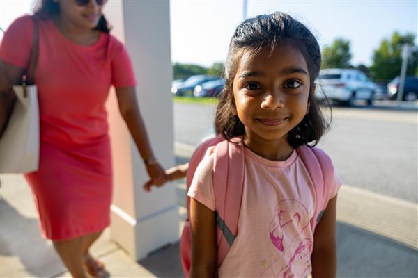 a girl student smiling 
